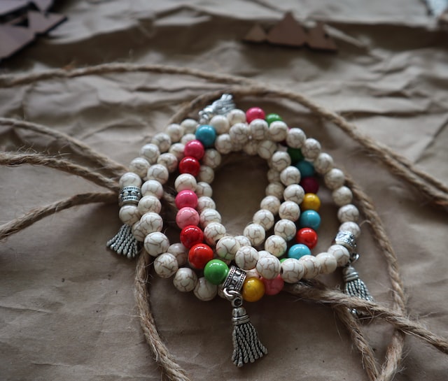 bracelets on brown surface