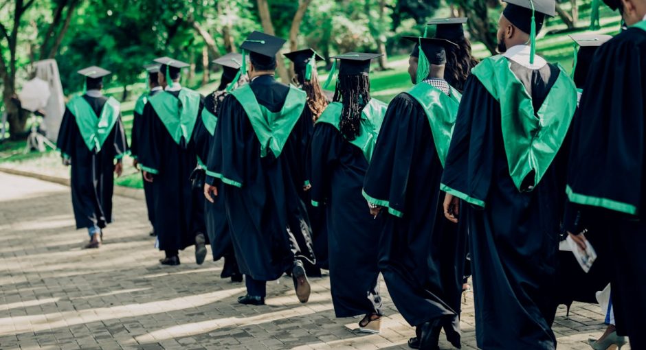 university-graduates-walking-in-outdoor-ceremony